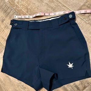 Vintage Boast tennis shorts. High waisted navy blue accentuates your waist